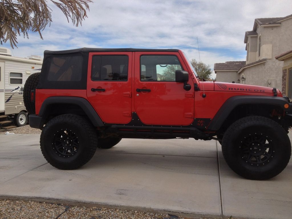 Lifted Red Jeep Wrangler Unlimited